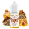 Οπτική απεικόνιση της συσκευασίας του Kings Crest Don Juan Tobacco Honey 30ml που πλαισιώνεται από τριμένα φύλλα καπνού μέλι και κηρήθρα